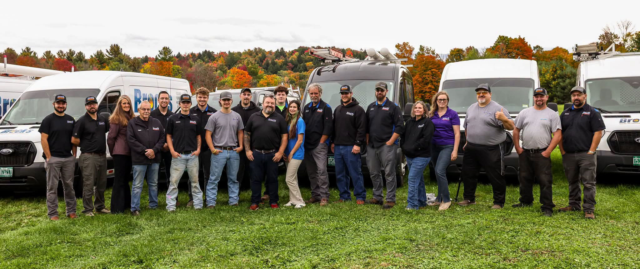 Group shot of the entire Brock's Crew in front of the Brock's Fleet