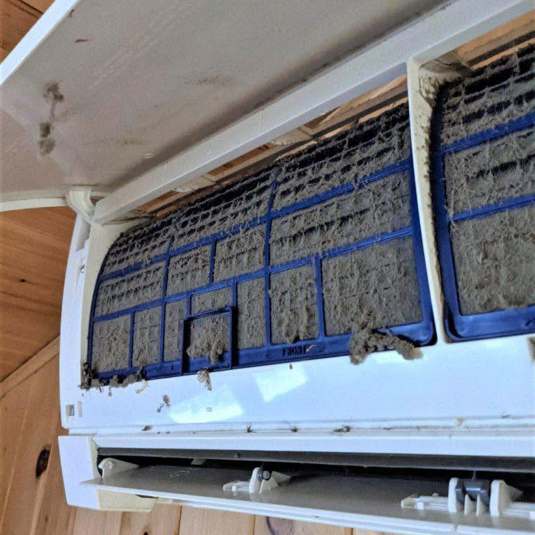 Inside of a dirty heat pump