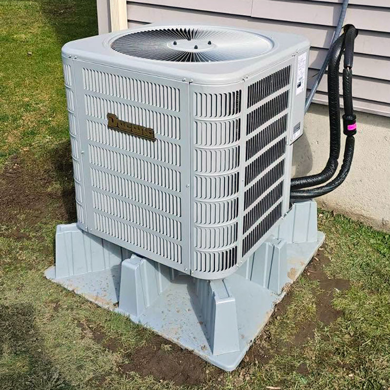 Outdoor AC unit installed at a residence